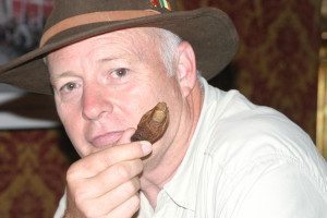 Author Ron Franscell just before he drank a cocktail containing this mummified human toe, the quest of his father-and-son road book, "The Sourtoe Cocktail Club."