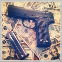 pistol and money