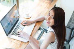 Beautiful business woman using a laptop computer